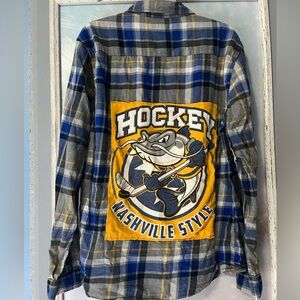 Back-stitched Nashville Preds shirt